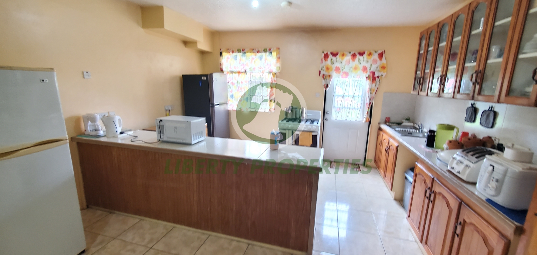 20260709_090524 Spacious Two-Storey Residential & Investment Property for Sale – Glen, St. George. List Price: $950,000.00 Eastern Caribbean Dollars- Open to offers