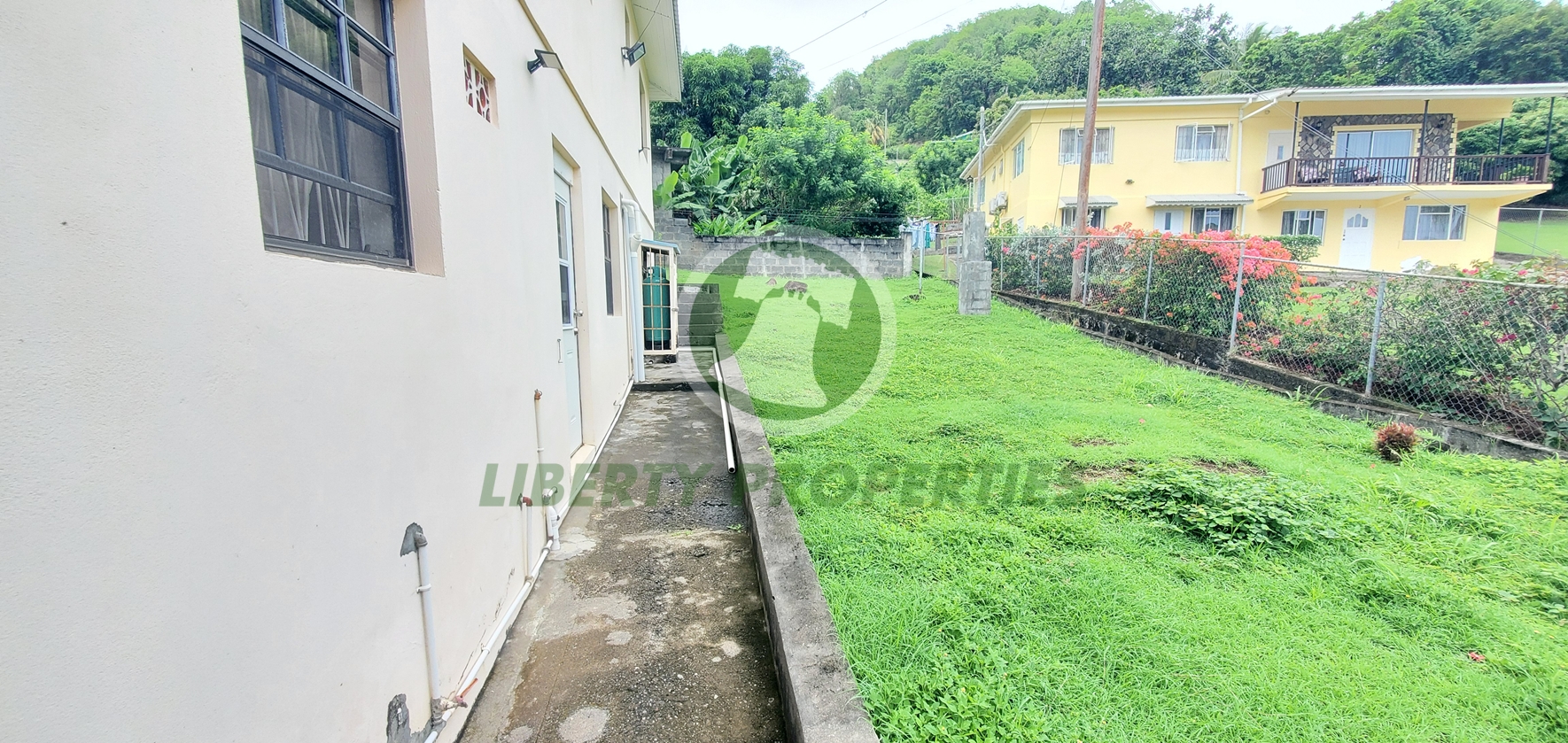 20260709_091541 Spacious Two-Storey Residential & Investment Property for Sale – Glen, St. George. List Price: $950,000.00 Eastern Caribbean Dollars- Open to offers