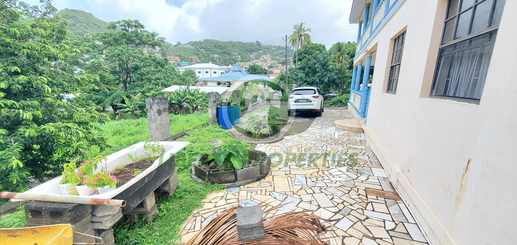 20260709_091548 Spacious Two-Storey Residential & Investment Property for Sale – Glen, St. George. List Price: $950,000.00 Eastern Caribbean Dollars- Open to offers